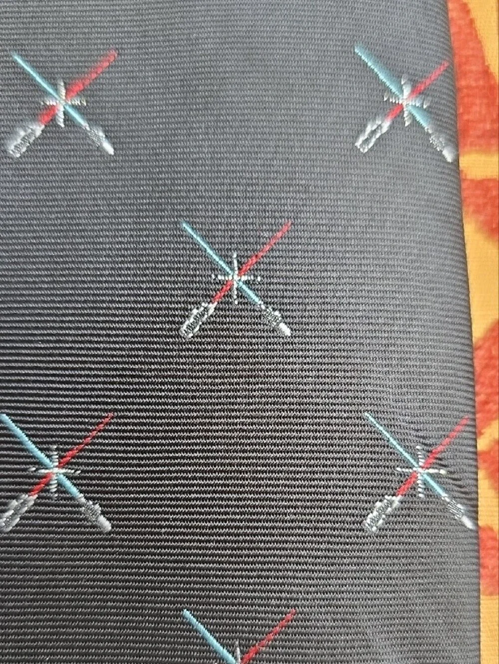 Classic Navy Tie with Light Sabre Cross Pattern. STAR WARS FANS!
